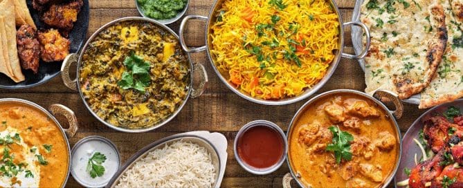 a table with different kinds of indian food in tampa fl